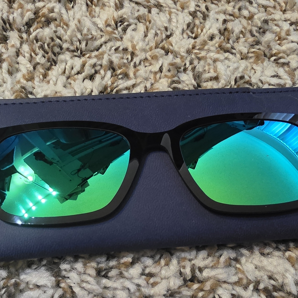 Stylish Black Sunglasses with Blue Lenses